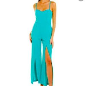 Bebe Women’s jumpsuit scuba crepe spaghetti straps front slits seafoam g…